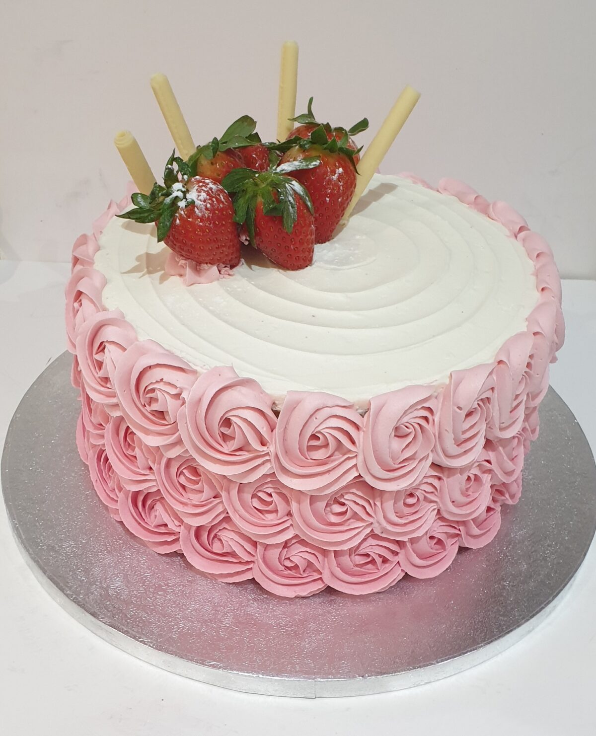 Pink Rossettes Strawberries Topped Buttercream Cake CB-NC349